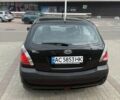 Черный Киа Рио, объемом двигателя 1.4 л и пробегом 230 тыс. км за 4400 $, фото 4 на Automoto.ua