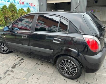 Чорний Кіа Ріо, об'ємом двигуна 1.4 л та пробігом 207 тис. км за 3952 $, фото 2 на Automoto.ua