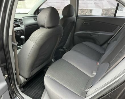 Чорний Кіа Ріо, об'ємом двигуна 1.4 л та пробігом 55 тис. км за 6800 $, фото 18 на Automoto.ua