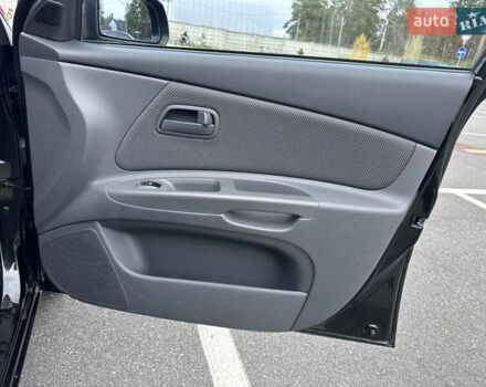 Черный Киа Рио, объемом двигателя 1.4 л и пробегом 158 тыс. км за 5000 $, фото 30 на Automoto.ua