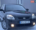 Черный Киа Рио, объемом двигателя 1.6 л и пробегом 233 тыс. км за 4199 $, фото 1 на Automoto.ua