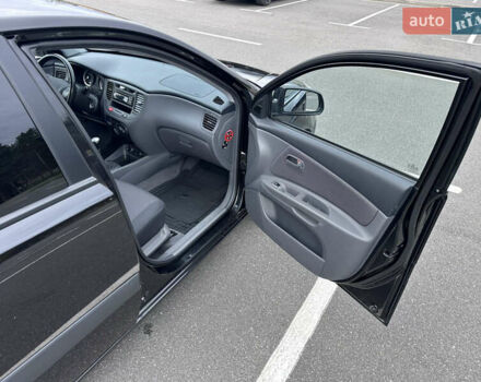 Черный Киа Рио, объемом двигателя 1.4 л и пробегом 158 тыс. км за 5000 $, фото 29 на Automoto.ua