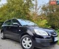 Черный Киа Рио, объемом двигателя 1.4 л и пробегом 184 тыс. км за 4999 $, фото 2 на Automoto.ua