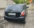 Черный Киа Рио, объемом двигателя 1.4 л и пробегом 110 тыс. км за 5999 $, фото 3 на Automoto.ua