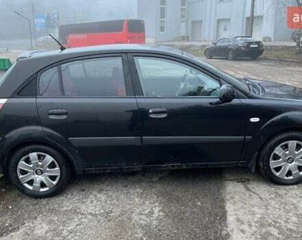 Черный Киа Рио, объемом двигателя 1.6 л и пробегом 230 тыс. км за 4900 $, фото 14 на Automoto.ua