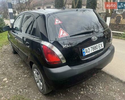 Чорний Кіа Ріо, об'ємом двигуна 1.4 л та пробігом 152 тис. км за 4500 $, фото 7 на Automoto.ua