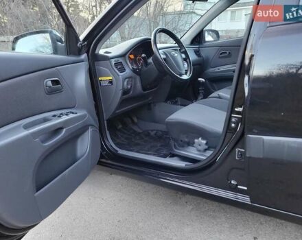Чорний Кіа Ріо, об'ємом двигуна 1.4 л та пробігом 184 тис. км за 4800 $, фото 16 на Automoto.ua
