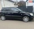 Чорний Кіа Ріо, об'ємом двигуна 1.4 л та пробігом 152 тис. км за 4500 $, фото 6 на Automoto.ua