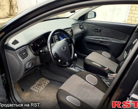 Черный Киа Рио, объемом двигателя 1.4 л и пробегом 110 тыс. км за 6399 $, фото 3 на Automoto.ua