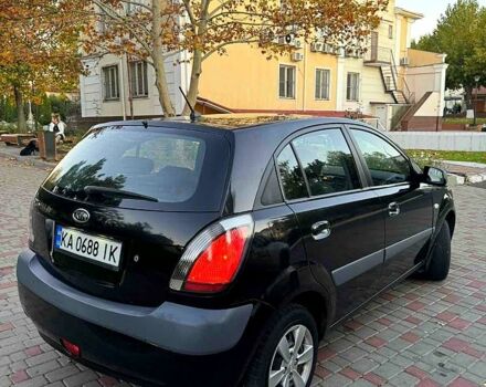Черный Киа Рио, объемом двигателя 1.4 л и пробегом 269 тыс. км за 2999 $, фото 3 на Automoto.ua