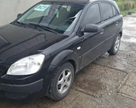 Чорний Кіа Ріо, об'ємом двигуна 2 л та пробігом 253 тис. км за 3534 $, фото 1 на Automoto.ua