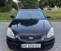 Чорний Кіа Ріо, об'ємом двигуна 1.4 л та пробігом 216 тис. км за 4500 $, фото 4 на Automoto.ua