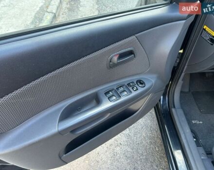Черный Киа Рио, объемом двигателя 1.4 л и пробегом 167 тыс. км за 5200 $, фото 7 на Automoto.ua