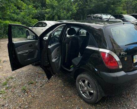 Чорний Кіа Ріо, об'ємом двигуна 1.4 л та пробігом 204 тис. км за 3888 $, фото 3 на Automoto.ua