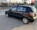 Черный Киа Рио, объемом двигателя 1.4 л и пробегом 205 тыс. км за 4000 $, фото 2 на Automoto.ua