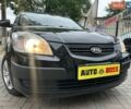 Чорний Кіа Ріо, об'ємом двигуна 1.4 л та пробігом 260 тис. км за 4800 $, фото 3 на Automoto.ua