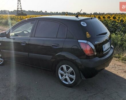 Чорний Кіа Ріо, об'ємом двигуна 1.4 л та пробігом 160 тис. км за 6200 $, фото 1 на Automoto.ua