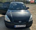 Черный Киа Рио, объемом двигателя 1.4 л и пробегом 103 тыс. км за 3400 $, фото 1 на Automoto.ua