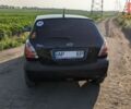 Черный Киа Рио, объемом двигателя 1.4 л и пробегом 160 тыс. км за 6200 $, фото 2 на Automoto.ua