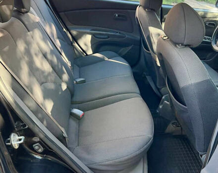 Черный Киа Рио, объемом двигателя 1.4 л и пробегом 269 тыс. км за 3400 $, фото 8 на Automoto.ua