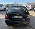 Чорний Кіа Ріо, об'ємом двигуна 1.4 л та пробігом 160 тис. км за 5494 $, фото 5 на Automoto.ua