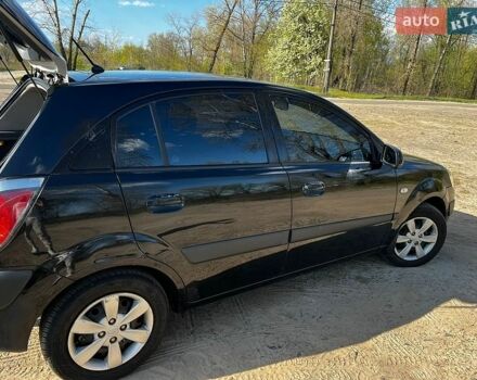 Черный Киа Рио, объемом двигателя 1.4 л и пробегом 103 тыс. км за 3400 $, фото 9 на Automoto.ua
