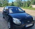 Черный Киа Рио, объемом двигателя 1.4 л и пробегом 226 тыс. км за 3700 $, фото 1 на Automoto.ua