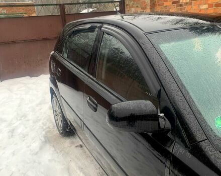 Черный Киа Рио, объемом двигателя 1.4 л и пробегом 860 тыс. км за 5300 $, фото 1 на Automoto.ua