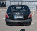 Черный Киа Рио, объемом двигателя 1.4 л и пробегом 287 тыс. км за 4400 $, фото 2 на Automoto.ua