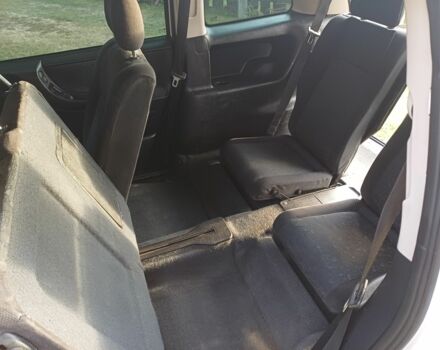 Черный Киа Рио, объемом двигателя 1.4 л и пробегом 204 тыс. км за 3897 $, фото 1 на Automoto.ua