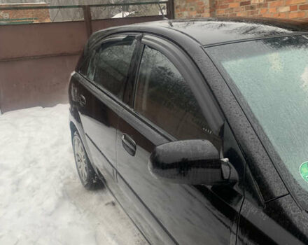 Черный Киа Рио, объемом двигателя 1.4 л и пробегом 86 тыс. км за 5300 $, фото 3 на Automoto.ua