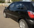 Чорний Кіа Ріо, об'ємом двигуна 1.4 л та пробігом 260 тис. км за 4600 $, фото 2 на Automoto.ua