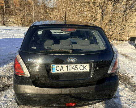 Чорний Кіа Ріо, об'ємом двигуна 1.4 л та пробігом 208 тис. км за 6200 $, фото 4 на Automoto.ua