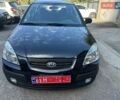 Черный Киа Рио, объемом двигателя 1.4 л и пробегом 167 тыс. км за 5600 $, фото 1 на Automoto.ua