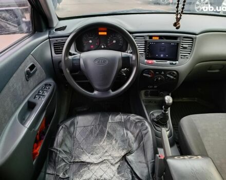 Черный Киа Рио, объемом двигателя 1.4 л и пробегом 274 тыс. км за 5290 $, фото 21 на Automoto.ua