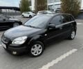 Чорний Кіа Ріо, об'ємом двигуна 1.4 л та пробігом 188 тис. км за 5100 $, фото 1 на Automoto.ua