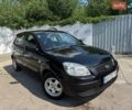 Чорний Кіа Ріо, об'ємом двигуна 1.4 л та пробігом 180 тис. км за 5999 $, фото 1 на Automoto.ua