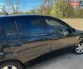Черный Киа Рио, объемом двигателя 1.4 л и пробегом 103 тыс. км за 3400 $, фото 2 на Automoto.ua