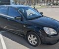 Черный Киа Рио, объемом двигателя 1.4 л и пробегом 287 тыс. км за 4400 $, фото 3 на Automoto.ua