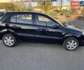 Черный Киа Рио, объемом двигателя 1.4 л и пробегом 205 тыс. км за 4000 $, фото 1 на Automoto.ua