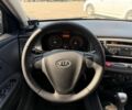 Чорний Кіа Ріо, об'ємом двигуна 1.4 л та пробігом 160 тис. км за 5494 $, фото 7 на Automoto.ua