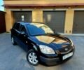 Черный Киа Рио, объемом двигателя 1.4 л и пробегом 212 тыс. км за 4430 $, фото 1 на Automoto.ua