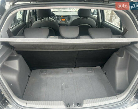 Чорний Кіа Ріо, об'ємом двигуна 1.4 л та пробігом 166 тис. км за 5450 $, фото 11 на Automoto.ua