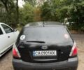 Чорний Кіа Ріо, об'ємом двигуна 1.4 л та пробігом 140 тис. км за 6500 $, фото 2 на Automoto.ua