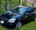 Чорний Кіа Ріо, об'ємом двигуна 1.4 л та пробігом 290 тис. км за 4600 $, фото 6 на Automoto.ua