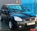 Черный Киа Рио, объемом двигателя 1.4 л и пробегом 349 тыс. км за 2599 $, фото 2 на Automoto.ua