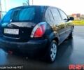 Черный Киа Рио, объемом двигателя 1.4 л и пробегом 349 тыс. км за 2599 $, фото 3 на Automoto.ua