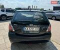 Чорний Кіа Ріо, об'ємом двигуна 1.4 л та пробігом 180 тис. км за 5999 $, фото 5 на Automoto.ua