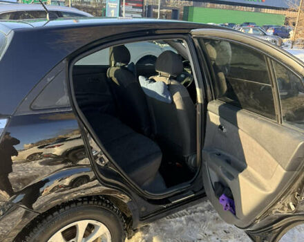 Чорний Кіа Ріо, об'ємом двигуна 1.4 л та пробігом 208 тис. км за 6200 $, фото 9 на Automoto.ua