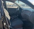 Чорний Кіа Ріо, об'ємом двигуна 1.4 л та пробігом 167 тис. км за 3200 $, фото 5 на Automoto.ua
